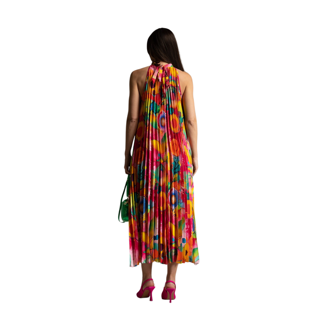 Back view of fuchsia version highlighting the pleats and colorful all-over print.