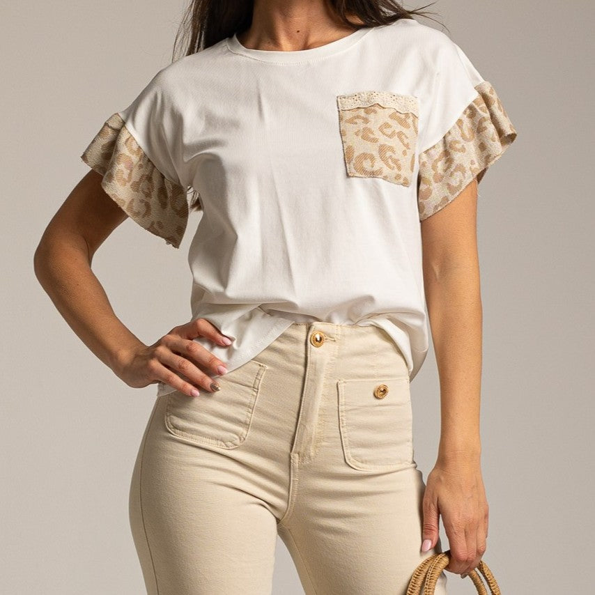 White cotton T-shirt with leopard ruffle sleeves and matching chest pocket, styled with beige jeans