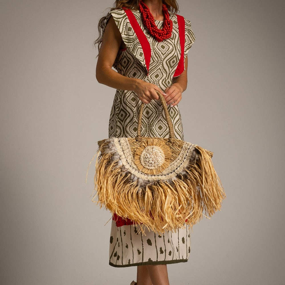 Patterned midi dress with red accents – close-up front view with accessories
