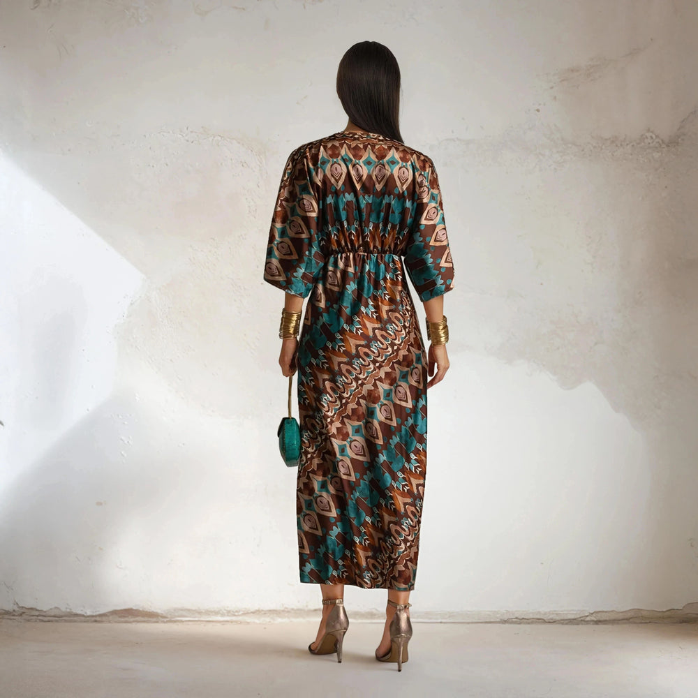 Full back view of Toscana satin dress with kimono sleeves and earthy geometric pattern