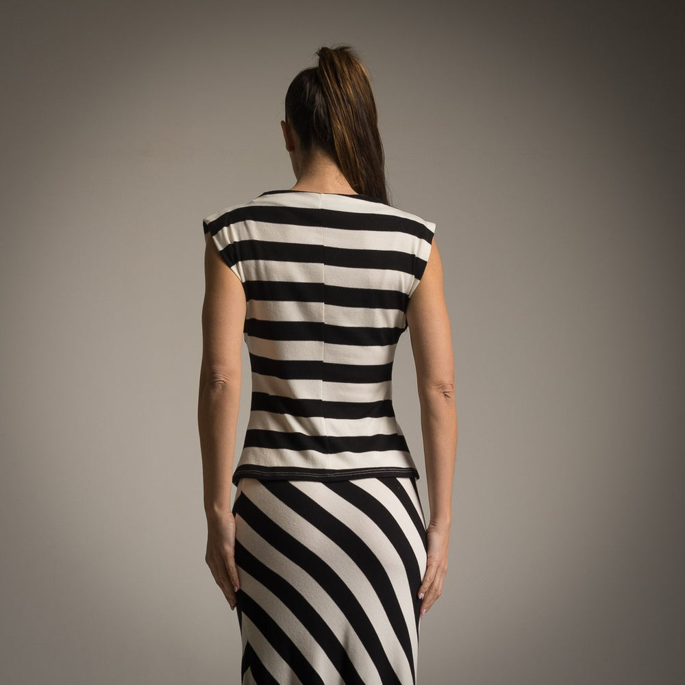 Back view of top and skirt set in black and white stripes with cap sleeves