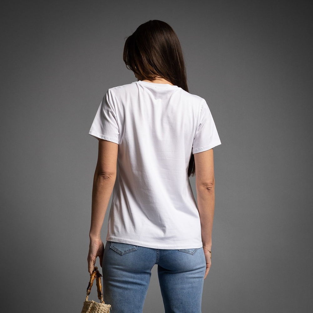 Back view of plain white short-sleeved T-shirt paired with denim jeans