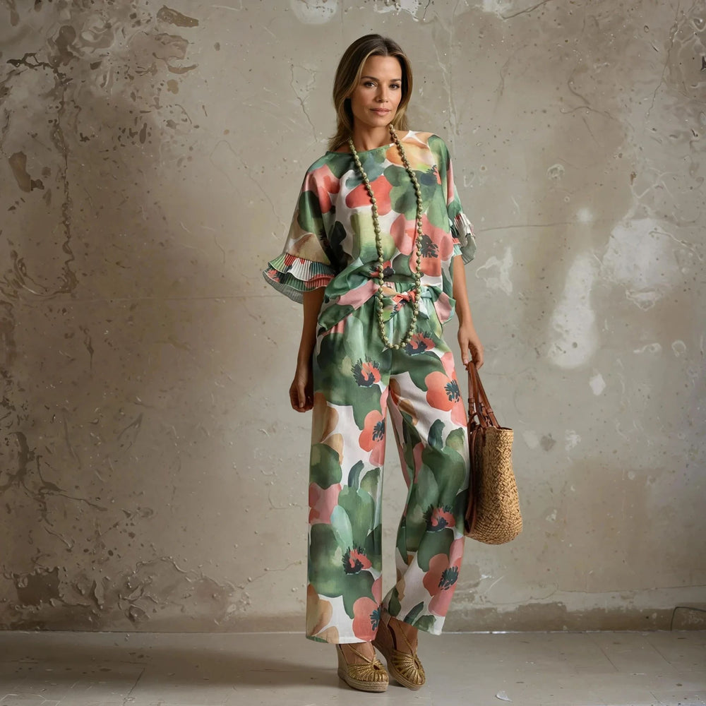 Model wearing green floral set with wide-leg pants and relaxed fit top