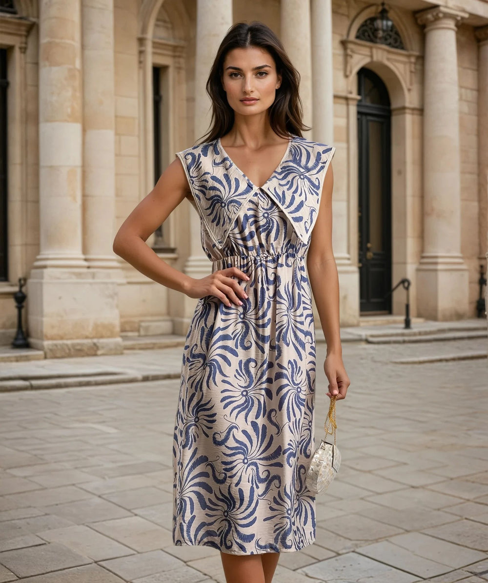 Close-up of blue printed fabric and pleated bodice details on a sleeveless summer dress – MariGiou Quality Textiles and Craftsmanship.