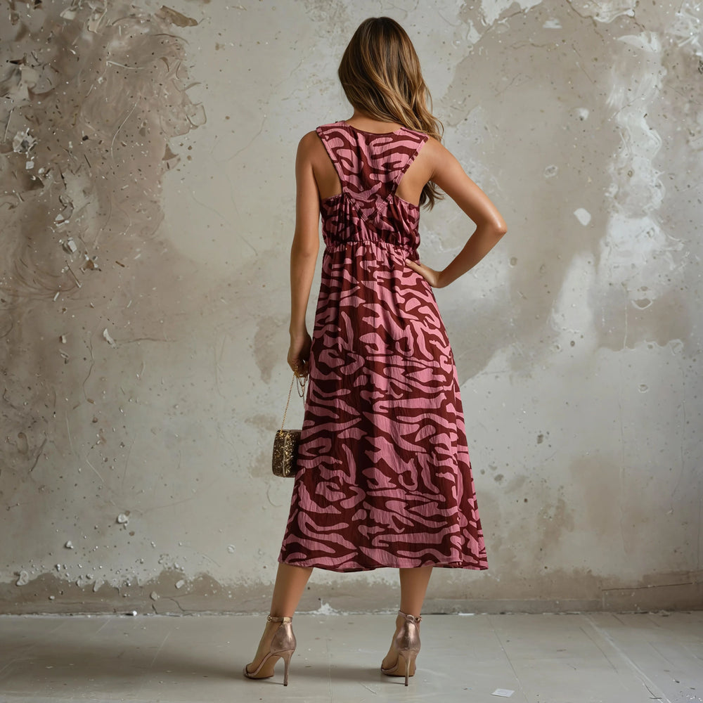Back view of a sleeveless old rose dress with pink print, showing the open back with subtle shoulder coverage.
