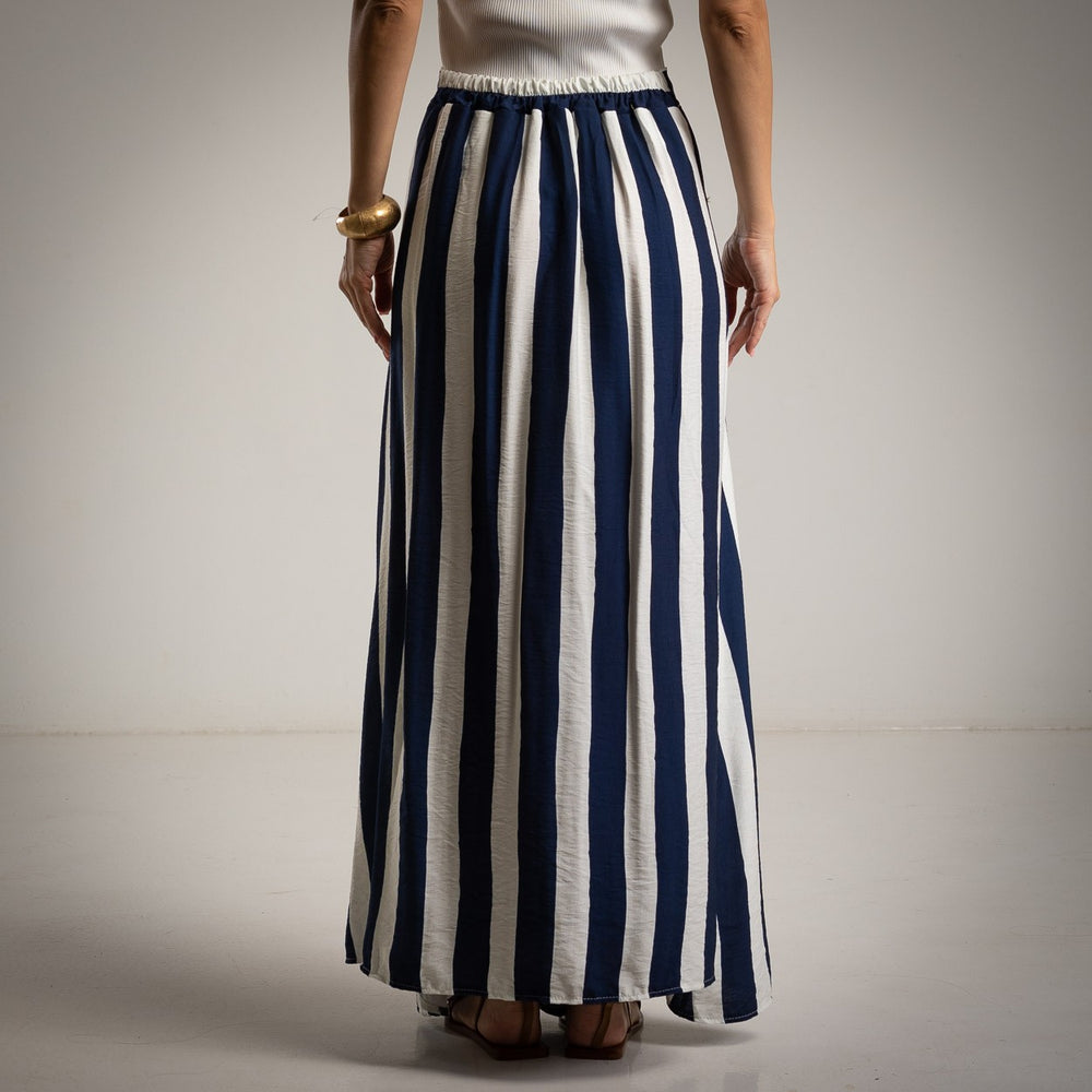 Back view of navy and white striped full-length skirt with stretch waistband