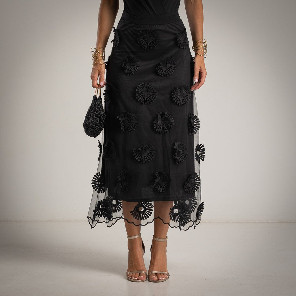 Black Italian midi skirt with sheer floral detailing – close-up