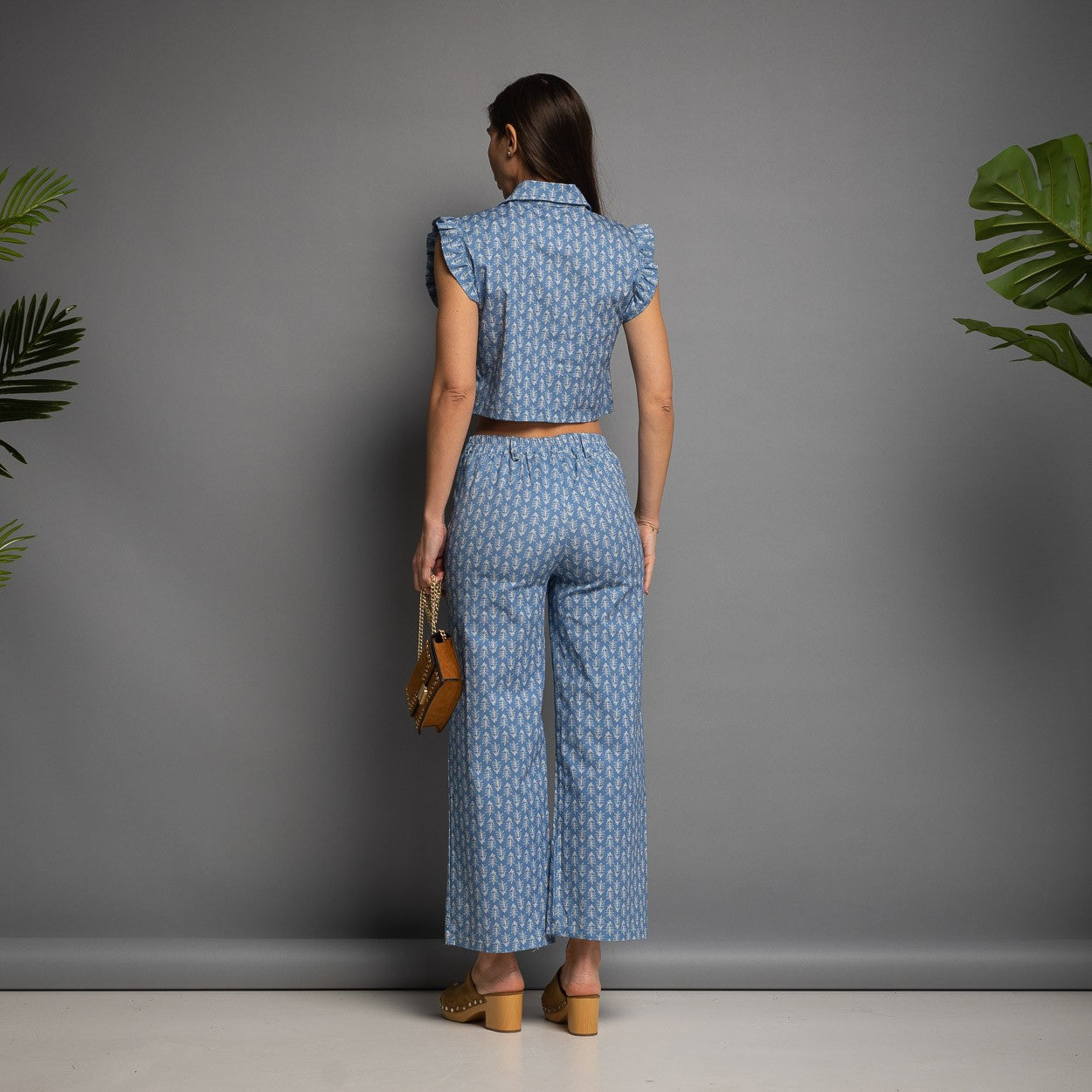 Denim printed two-piece set back view with cropped top and wide-leg pants