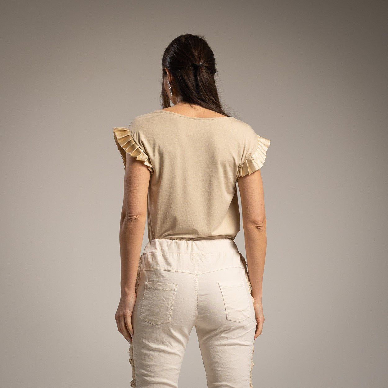 Back view of the Amalfi Ruffle Sleeve Top in Soft Vanilla Cream showing the relaxed fit.