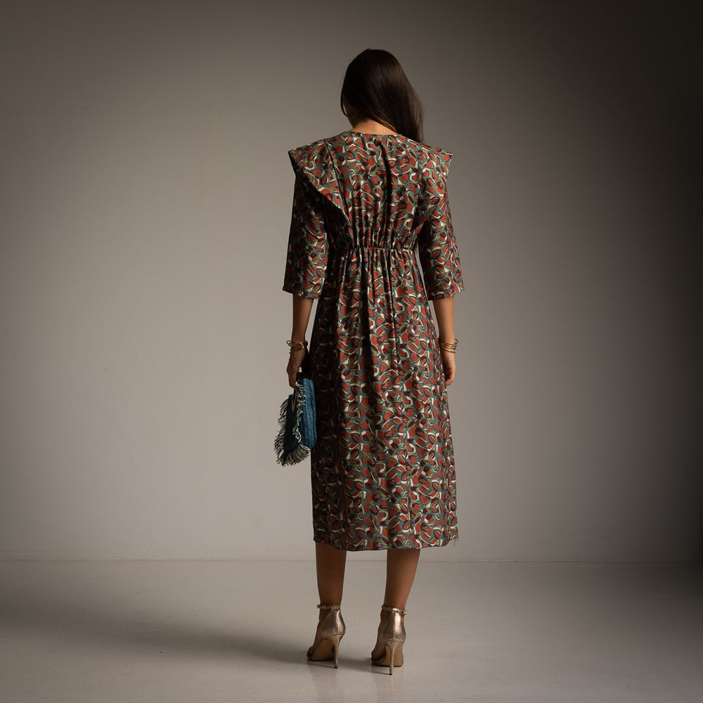 Back view of MARIΓIOÚ midi dress with elastic waist and autumn print, Made in Italy