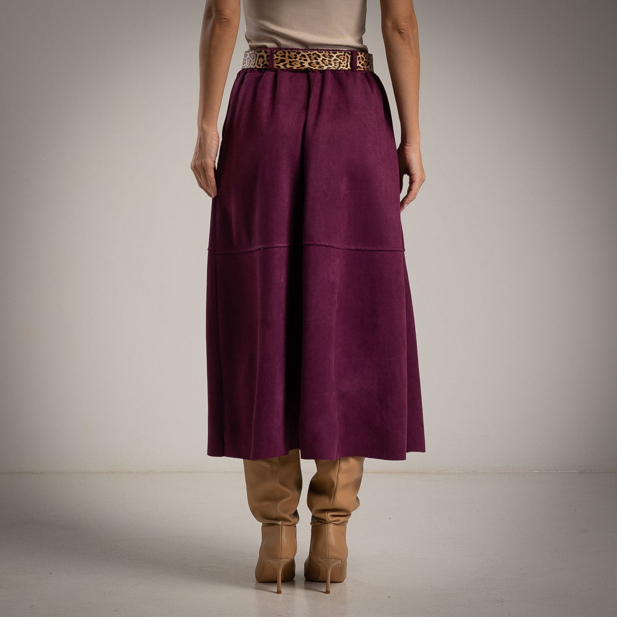 Back view of the Bianca suede midi skirt with belt in Black Cherry