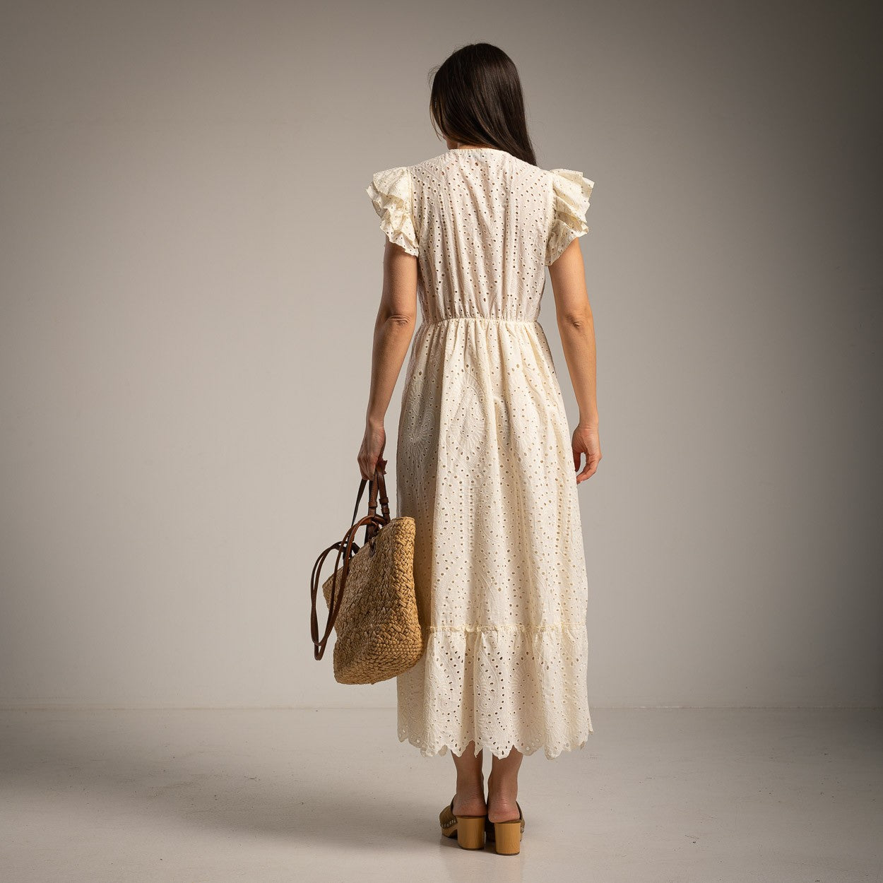 Boho chic broderie midi dress in ivory white back view with soft flowy fit