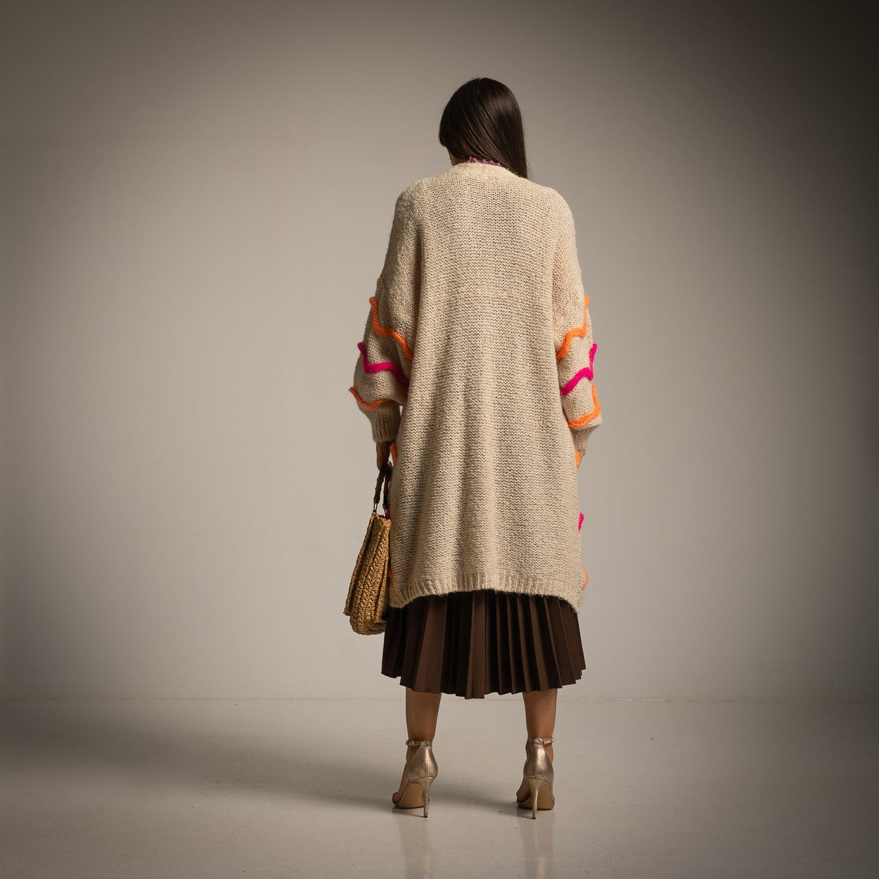 Back view of beige chunky knit long cardigan with colorful sleeves – Made in Italy | MARIΓIOÚ