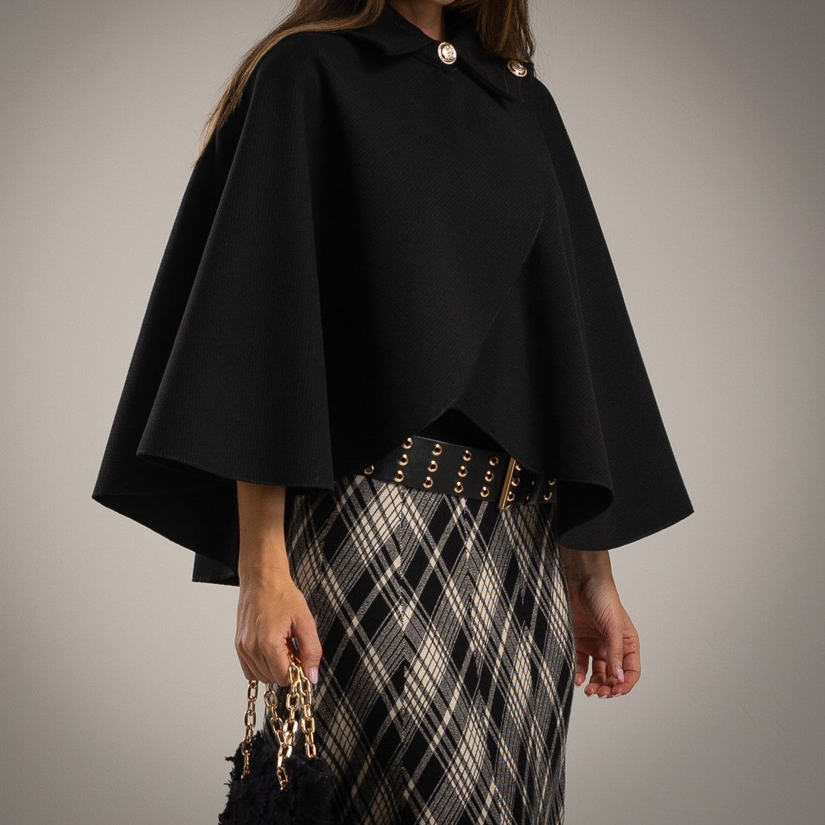 MARIΓIOÚ black cape with gold buttons – close-up front view