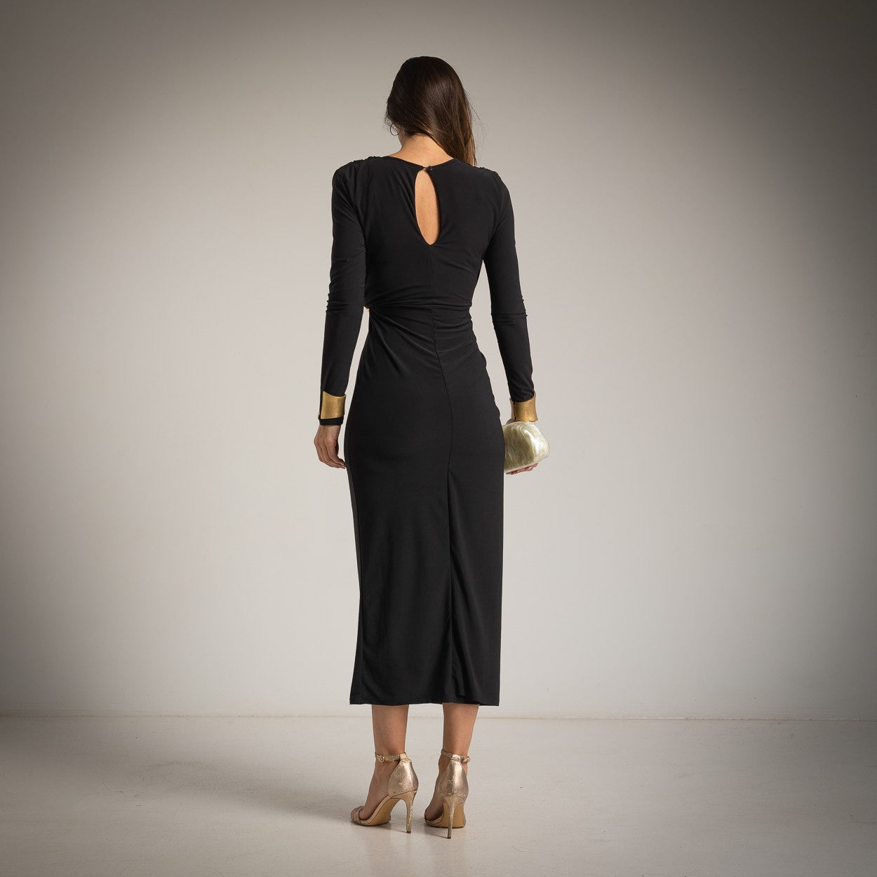Black draped midi dress with long sleeves – back view