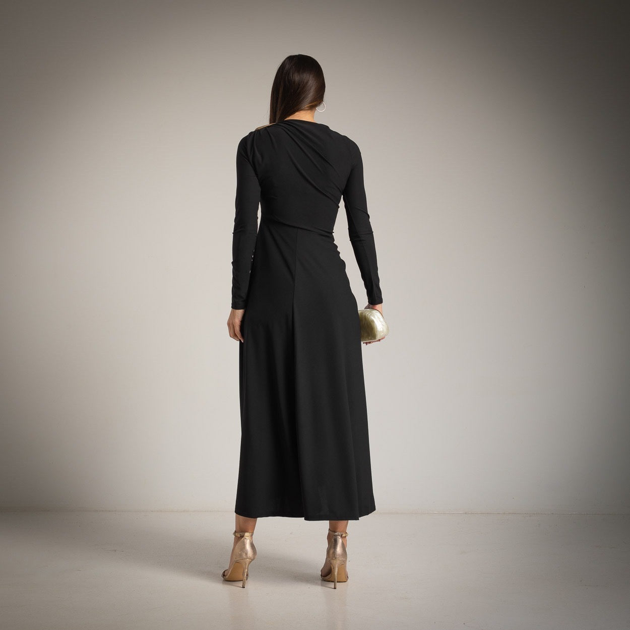 Black draped midi dress with long sleeves – back view