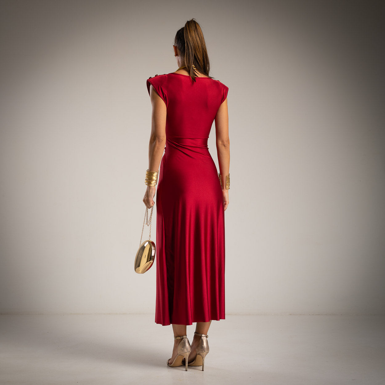 Back view of red elegant midi dress by MARIΓIOÚ