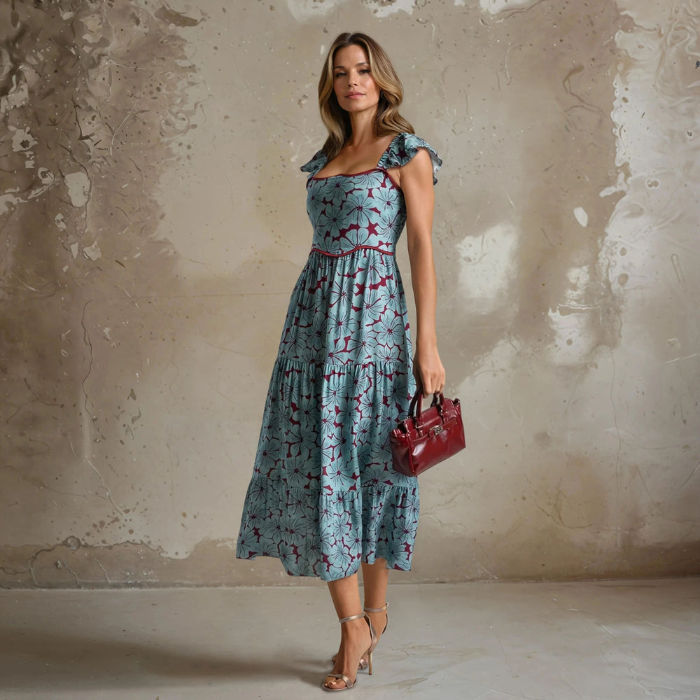 MARIΓIOÚ Fall 2025 floral midi dress in dusty blue with burgundy print, 100% viscose – styled with heels