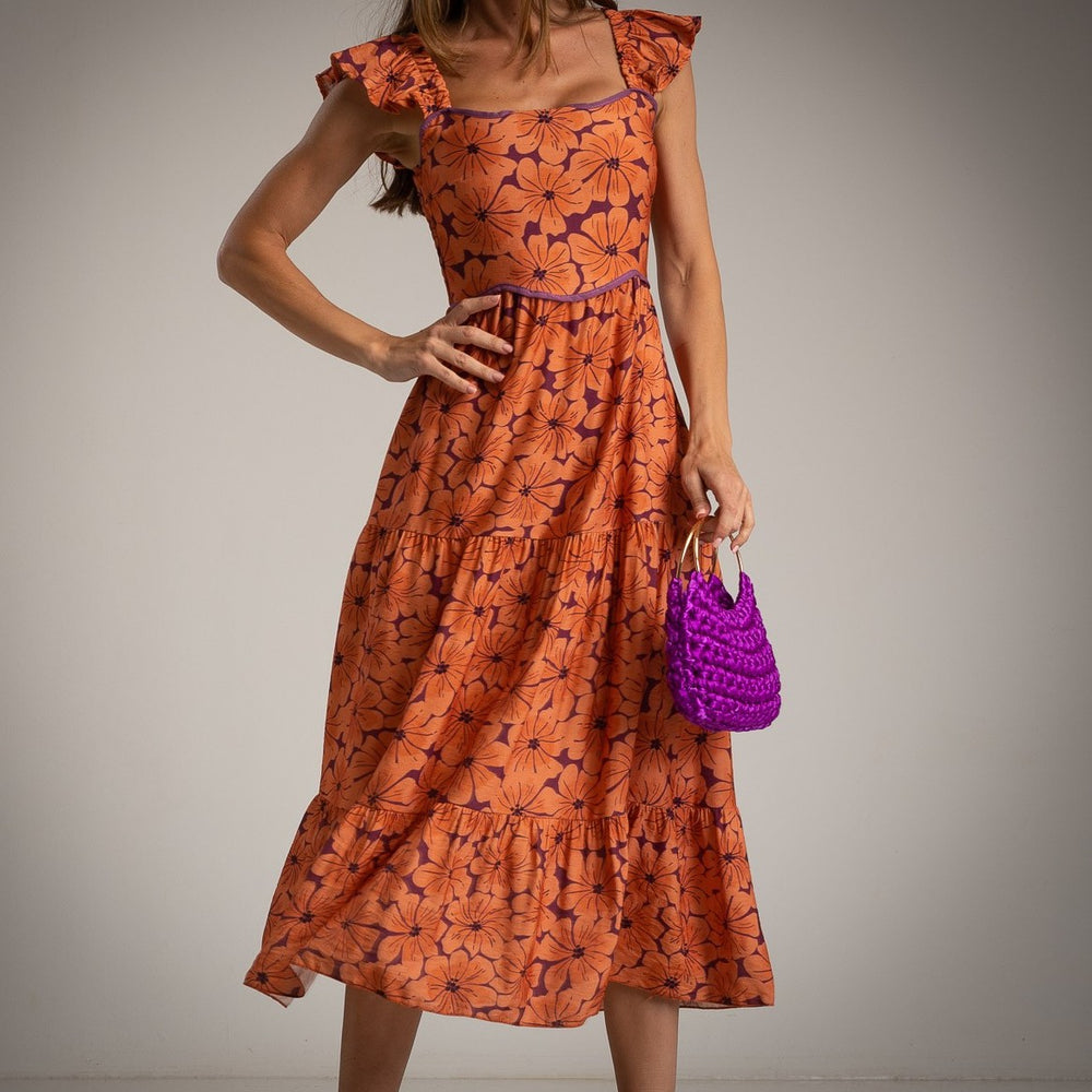 MARIΓIOÚ Fall 2025 floral midi dress in rust orange with violet flowers, 100% viscose – front view