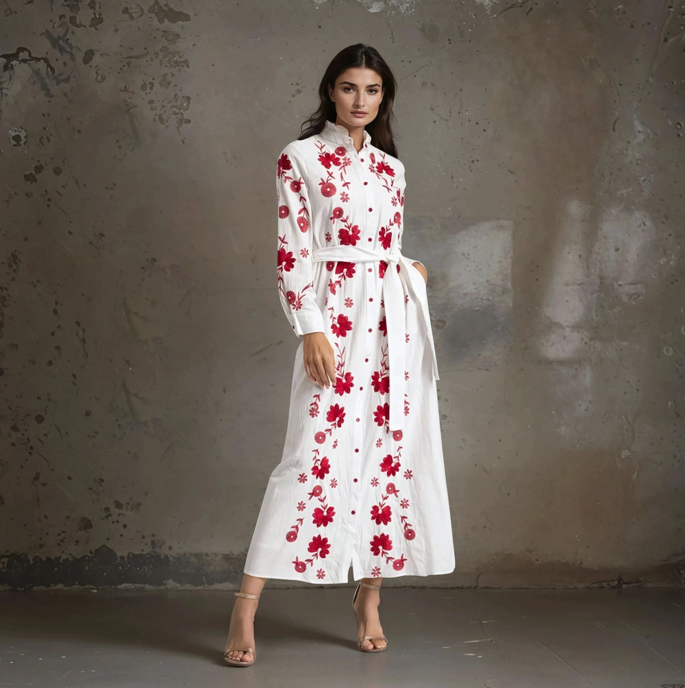 Model wearing long sleeve embroidered cotton dress with high collar – MARIΓIOÚ