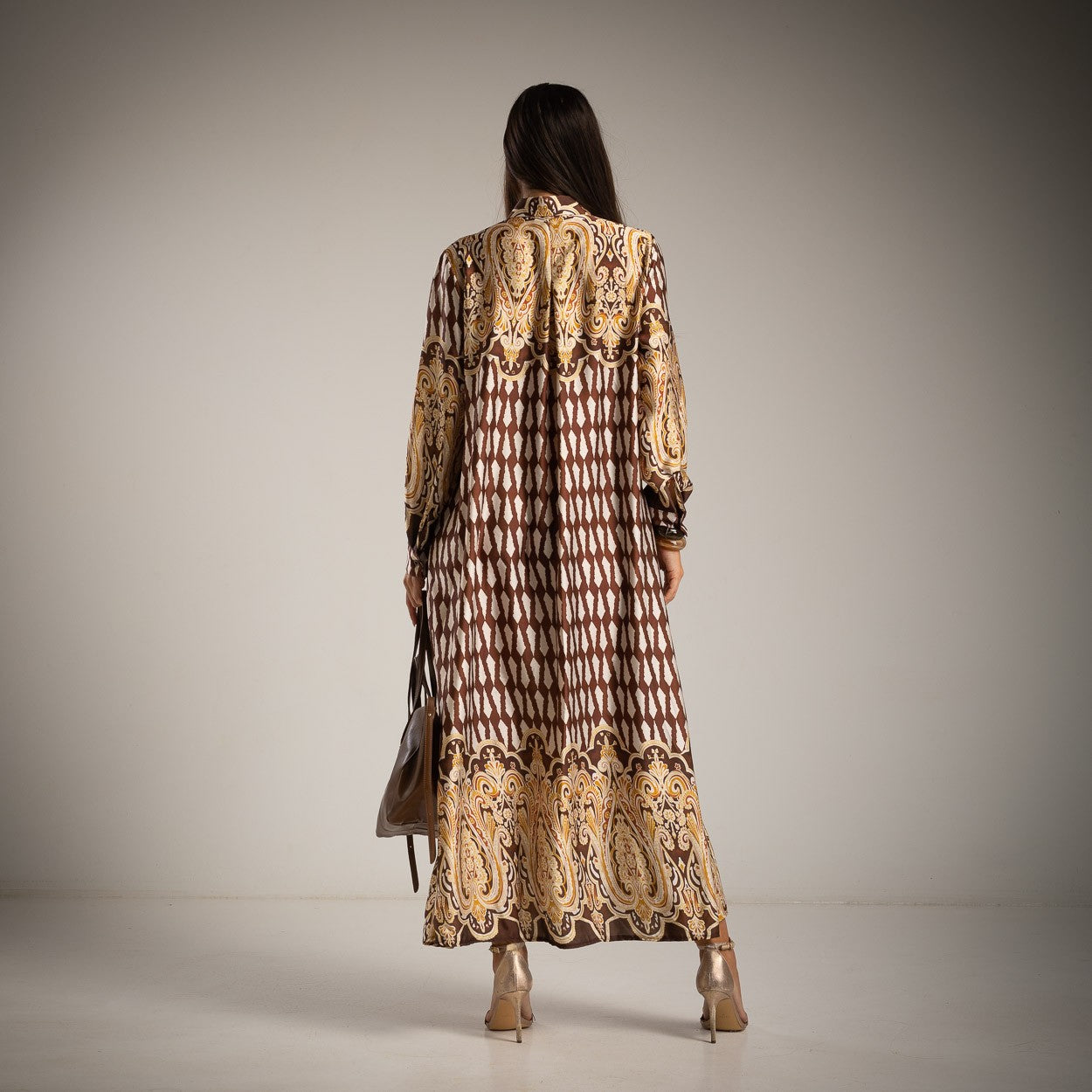 Back view of elegant chocolate maxi dress with baroque border – Made in Italy | MARIΓIOÚ