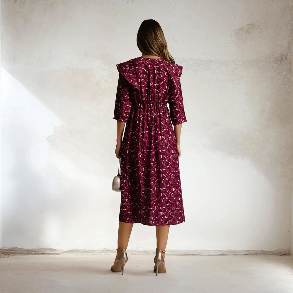 Back view of Bugainvillea floral autumn midi dress with three-quarter sleeves, made in Italy