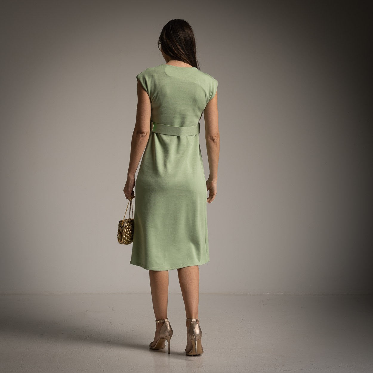 Back view of MARIΓIOÚ mint midi dress with belt in very soft smooth fabric