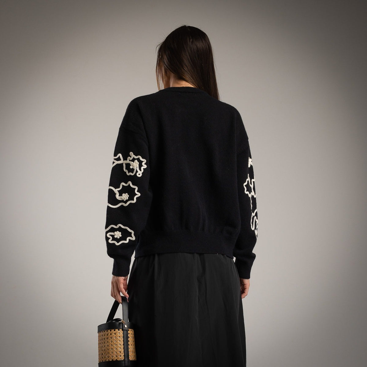 Black floral embroidered knit sweater with balloon sleeves - back view