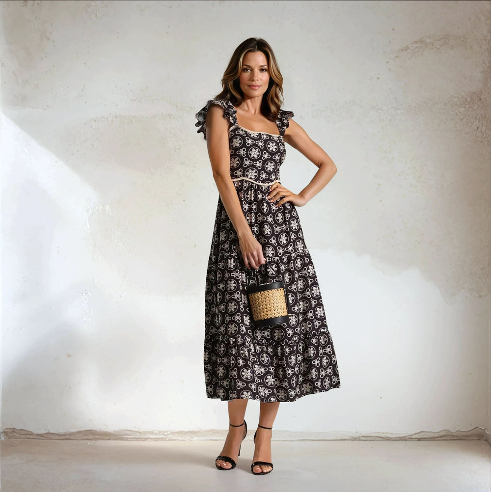 MARIΓIOÚ retro midi dress in black with cream floral pattern, 100% viscose – front view