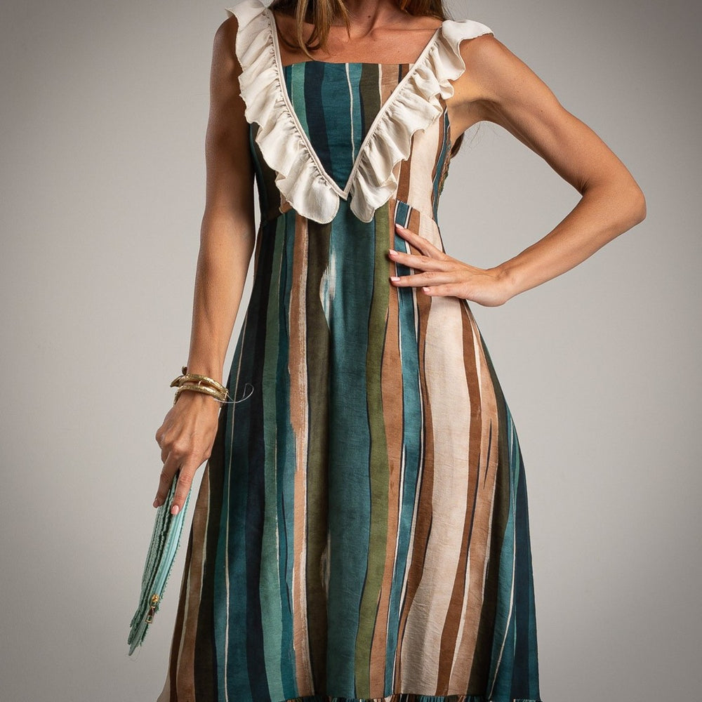 Close-up of MARIΓIOÚ striped petrol midi dress, featuring elegant ruffle straps and vertical stripe pattern