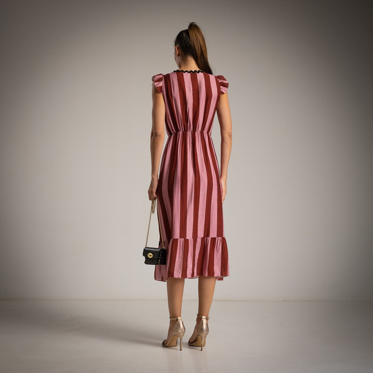 Striped midi dress with ruffle hem back view – MARIΓIOÚ