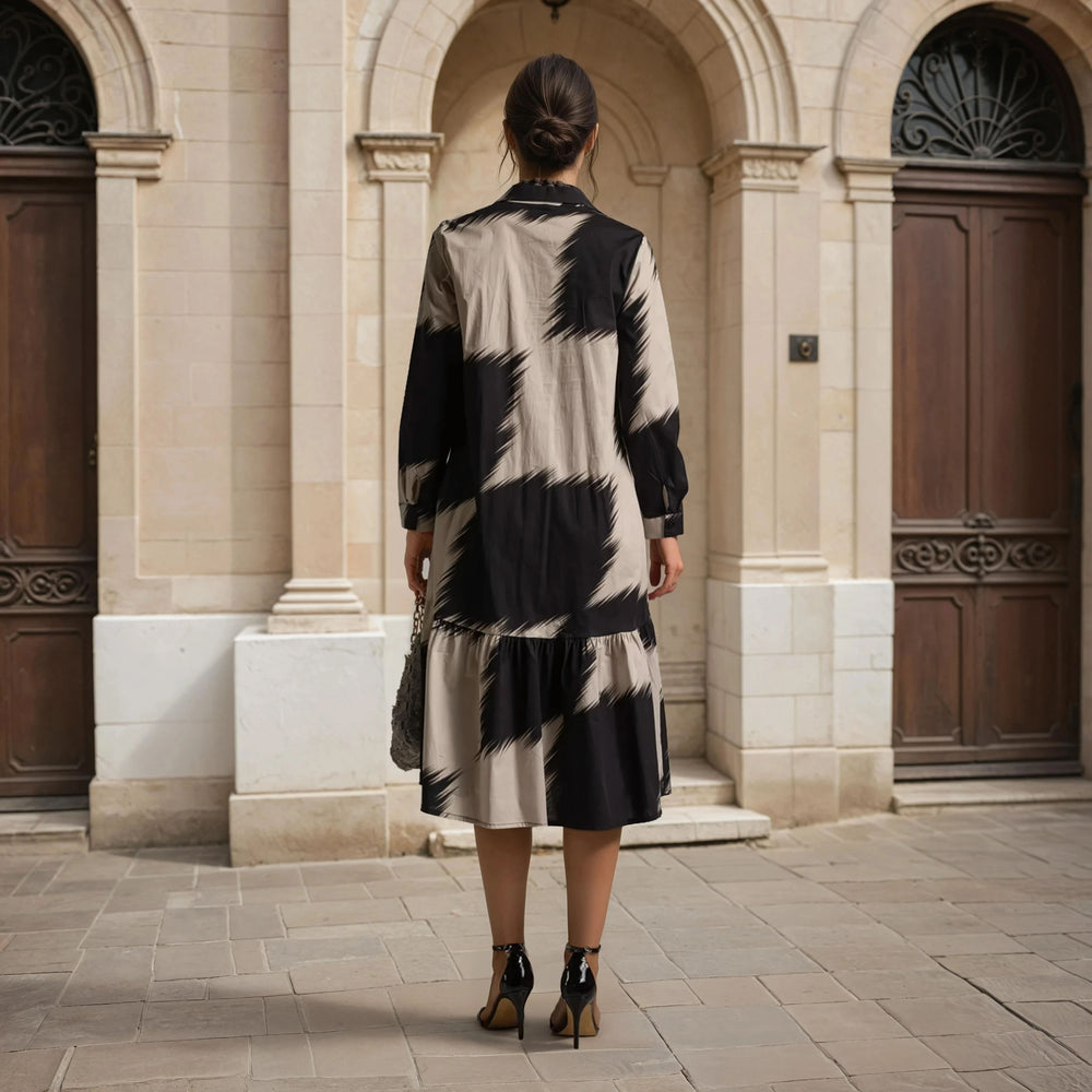 Back view of oversize long sleeve midi dress with abstract print – Autumn 2025 Collection