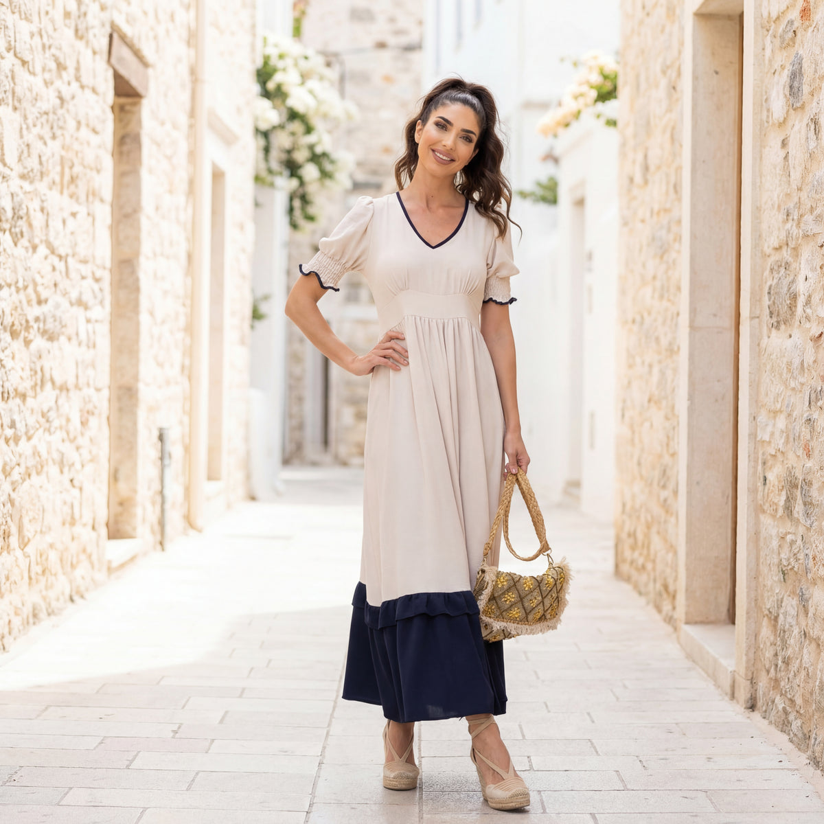 Romantic cream midi summer dress styled outdoors, elegant and airy summer outfit