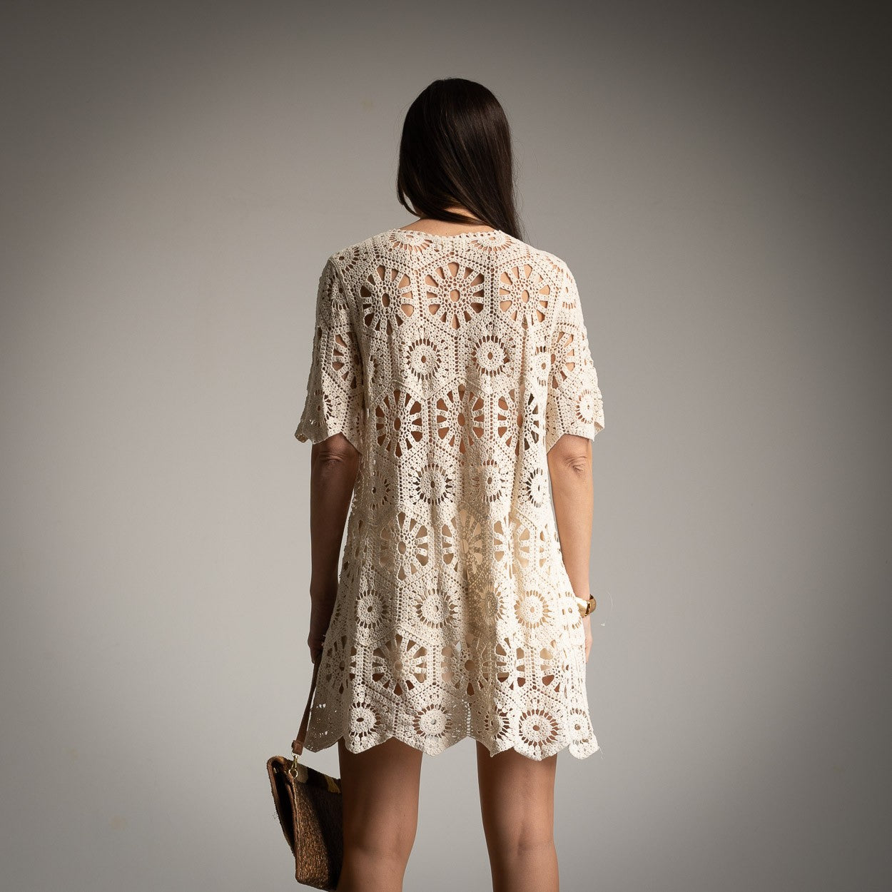 Back view of Soft Sand crochet beach cover-up cardigan with openwork pattern