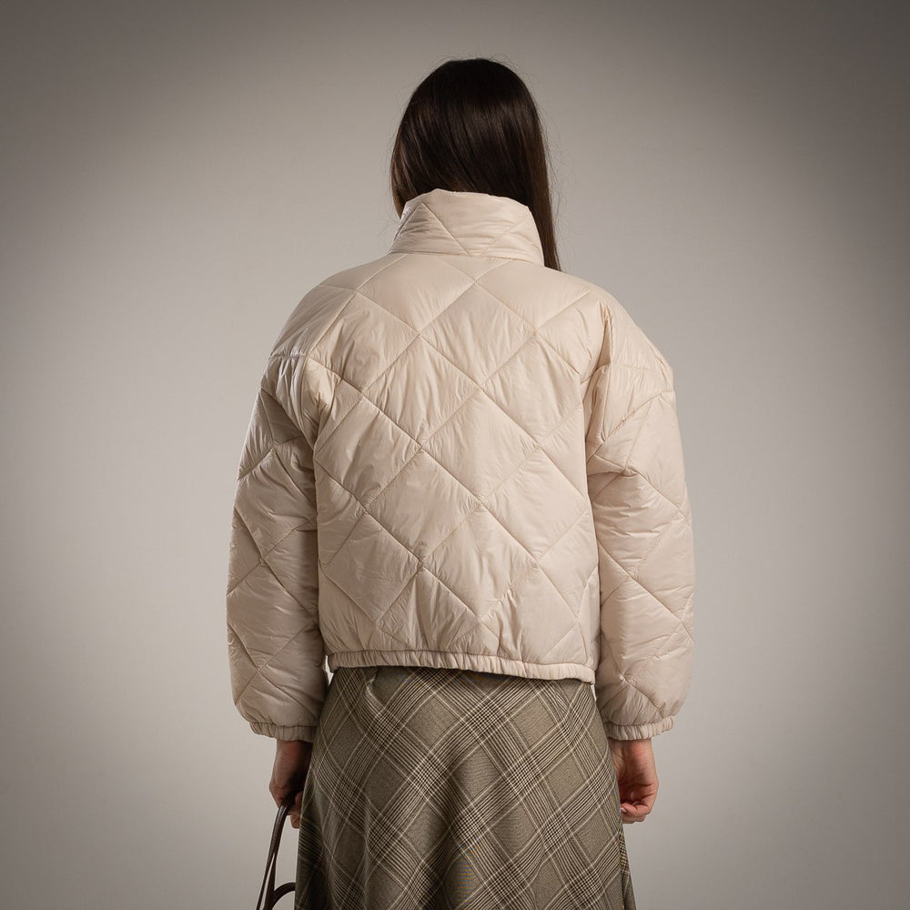 Beige padded jacket with quilted design – back view