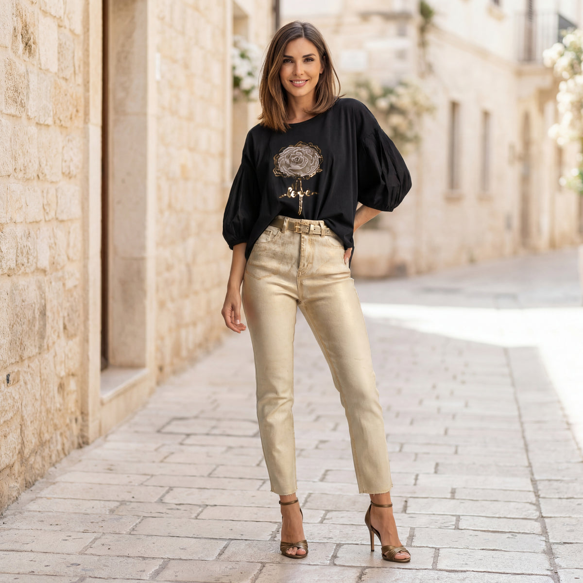Black puff sleeve love rose shirt styled with gold trousers by MARIΓIOÚ