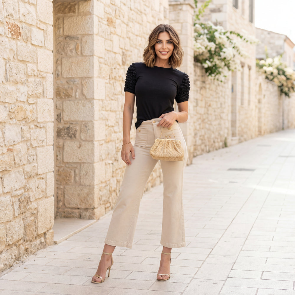 Black ribbed ruffle sleeve shirt styled for chic everyday look by MARIΓIOÚ