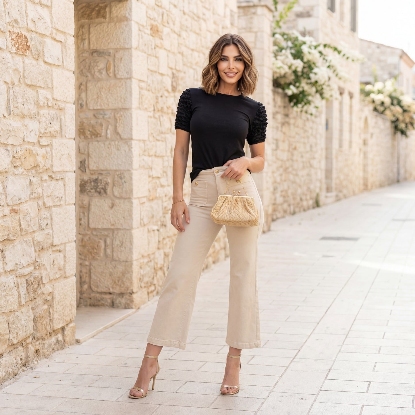 Black ribbed ruffle sleeve shirt styled for chic everyday look by MARIΓIOÚ