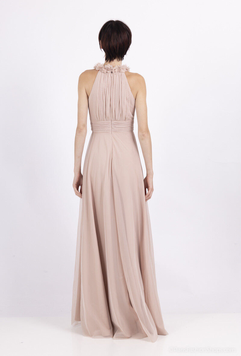 Back view of blush wedding guest maxi dress with halter neckline