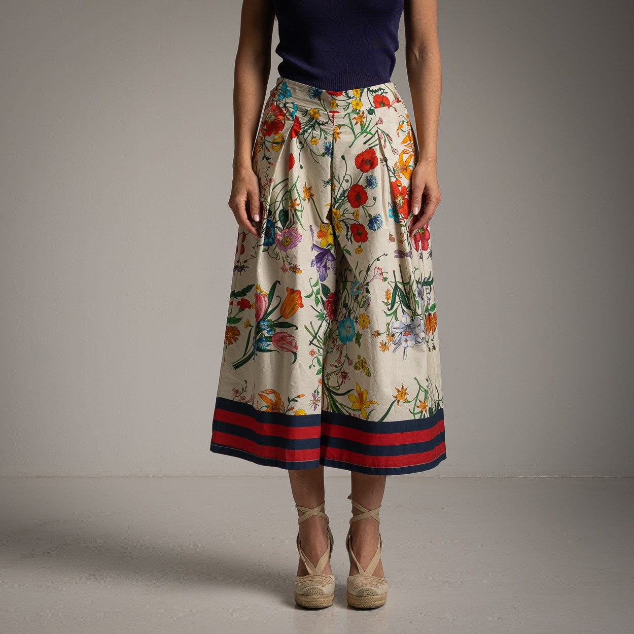 Front view of floral cotton culotte pants in Ivory White featuring a vibrant botanical print and comfortable wide-leg fit.