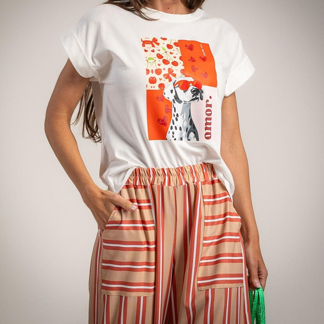 Graphic t-shirt in soft ivory white with dog print and colorful design front view