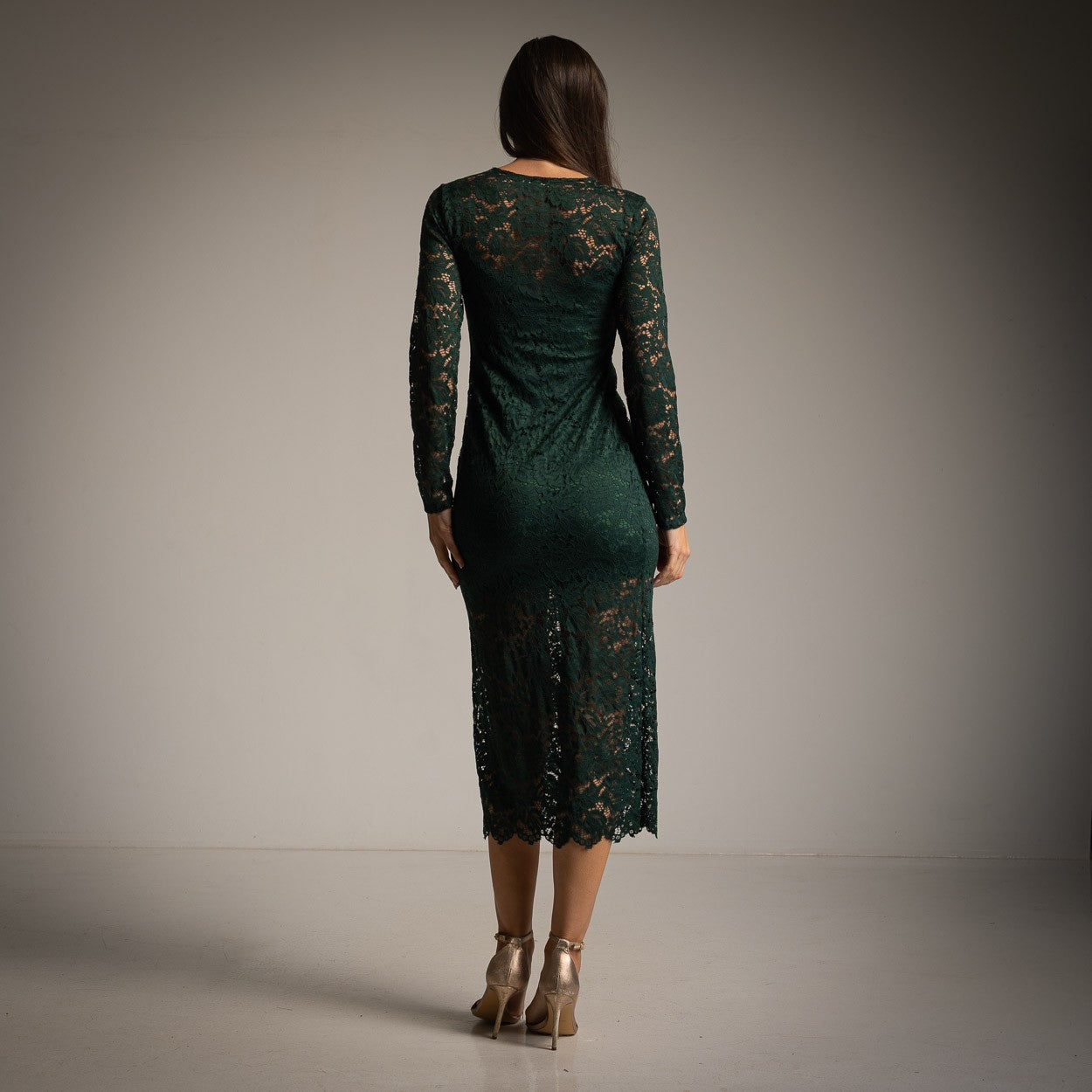 Emerald green lace midi dress – studio back view