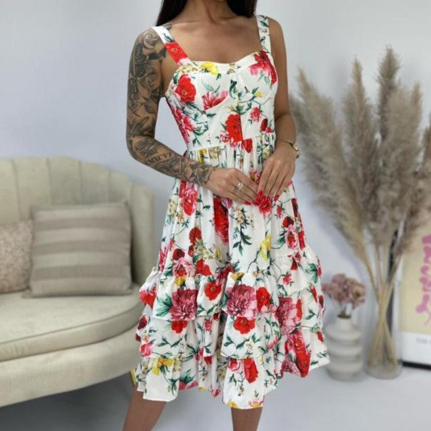 Close-up of floral print midi dress in ivory white with red and pink flowers