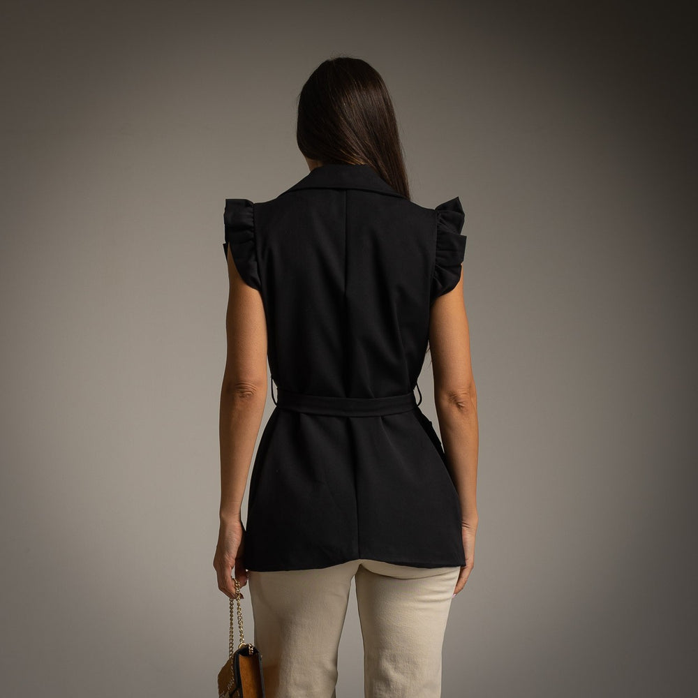Black sleeveless belted vest with lapel collar and ruffled cap sleeves - back view