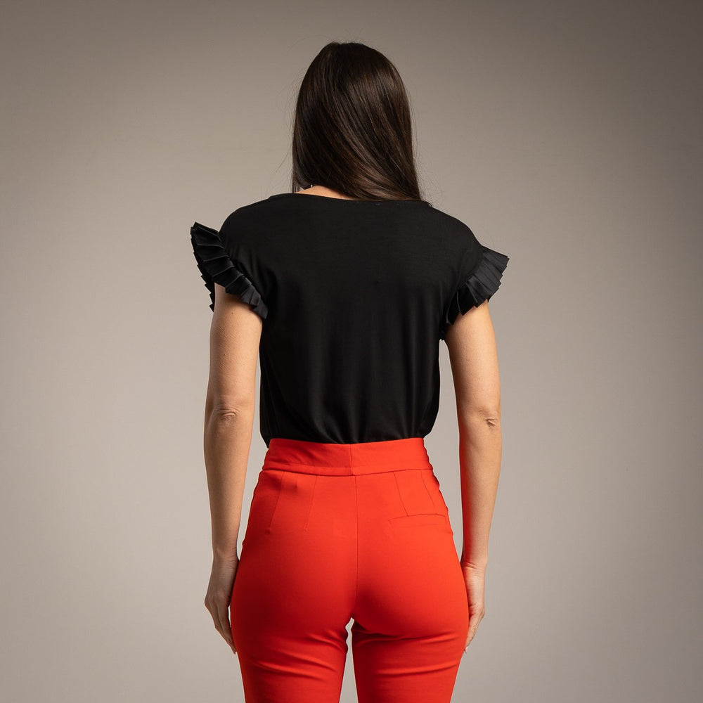 Back view of the Amalfi Ruffle Sleeve Top in Classic Black showing the relaxed fit.