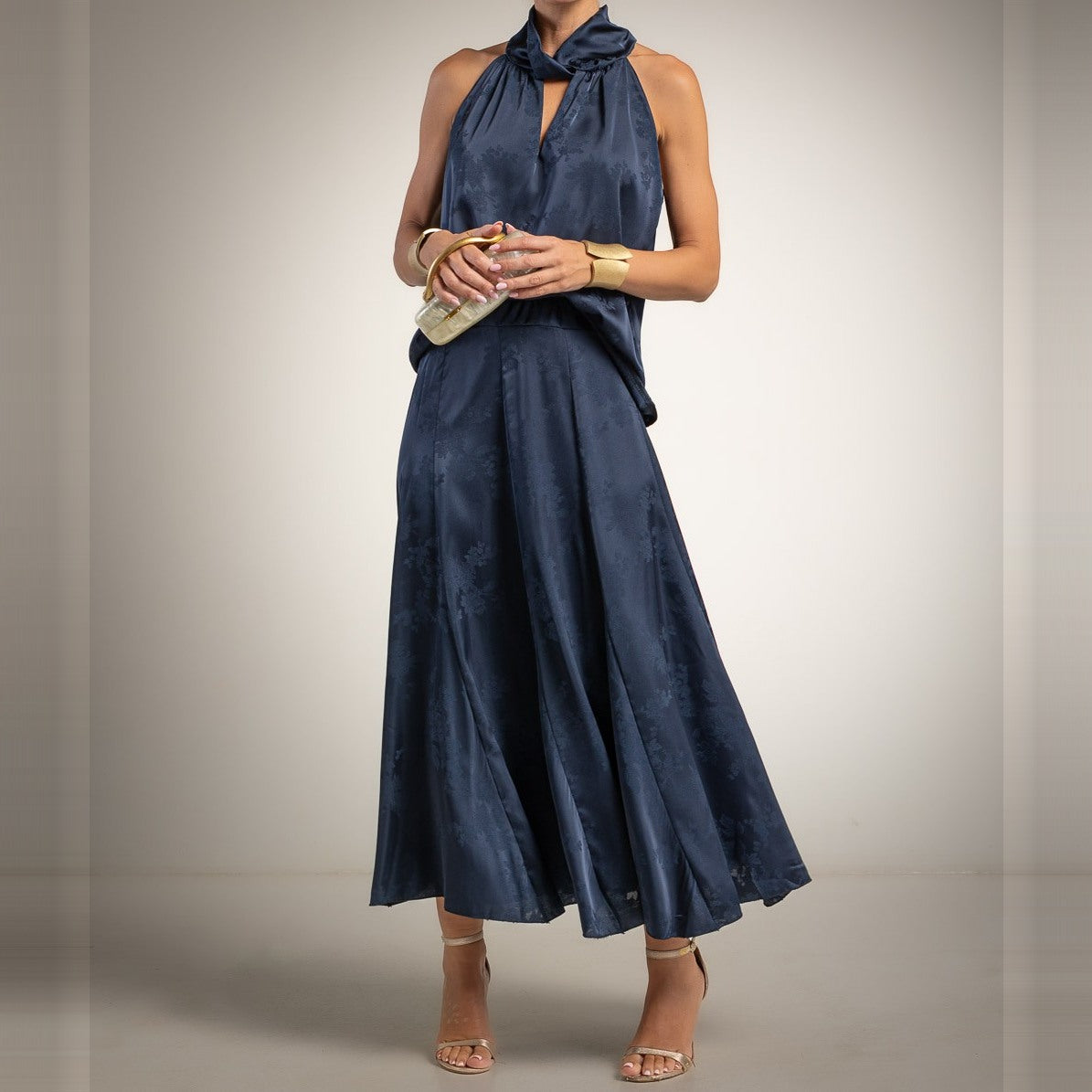 Midnight Blue satin jacquard halter neck top with scarf collar and flared midi skirt - front view