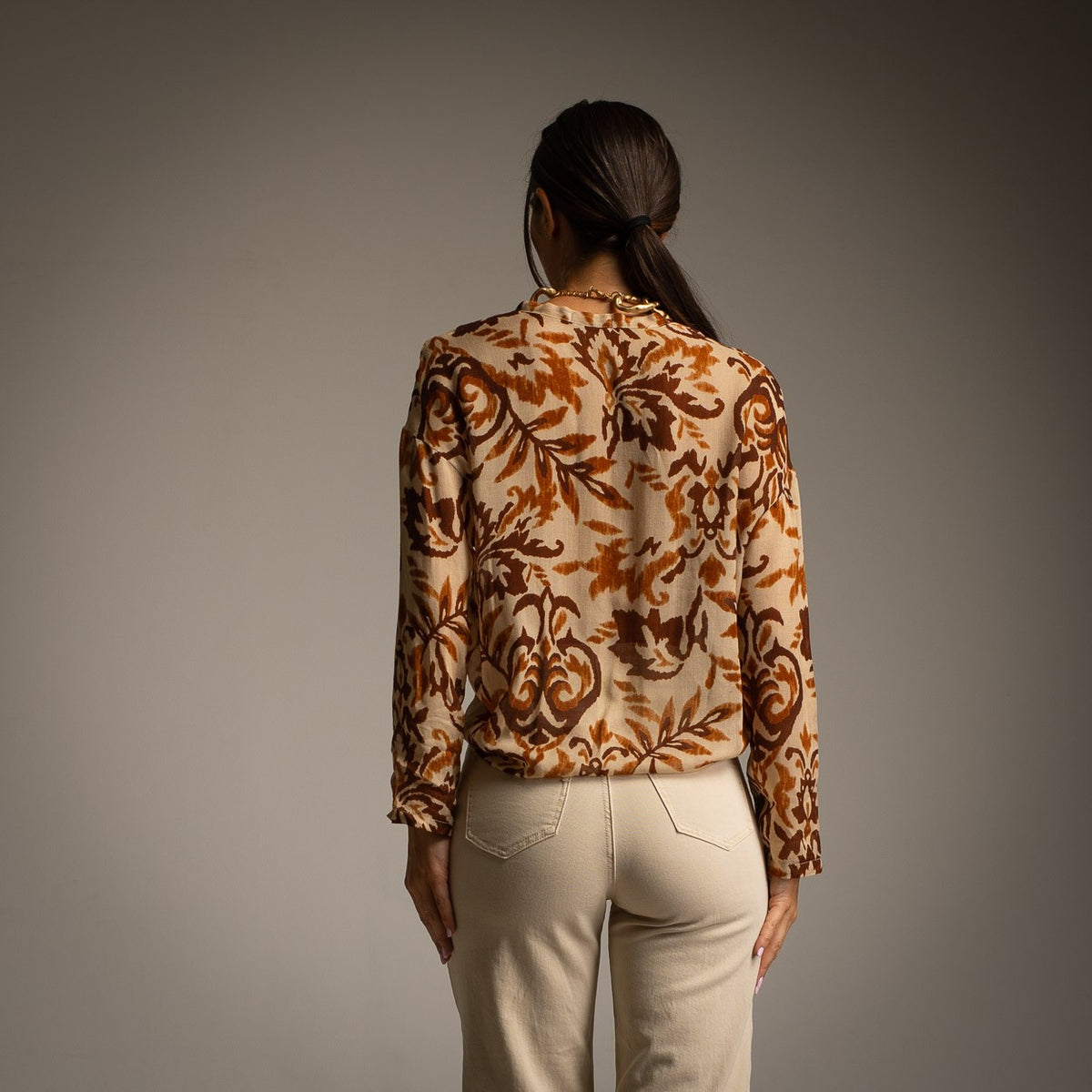 Latte Beige baroque print blouse with tie neckline - back view