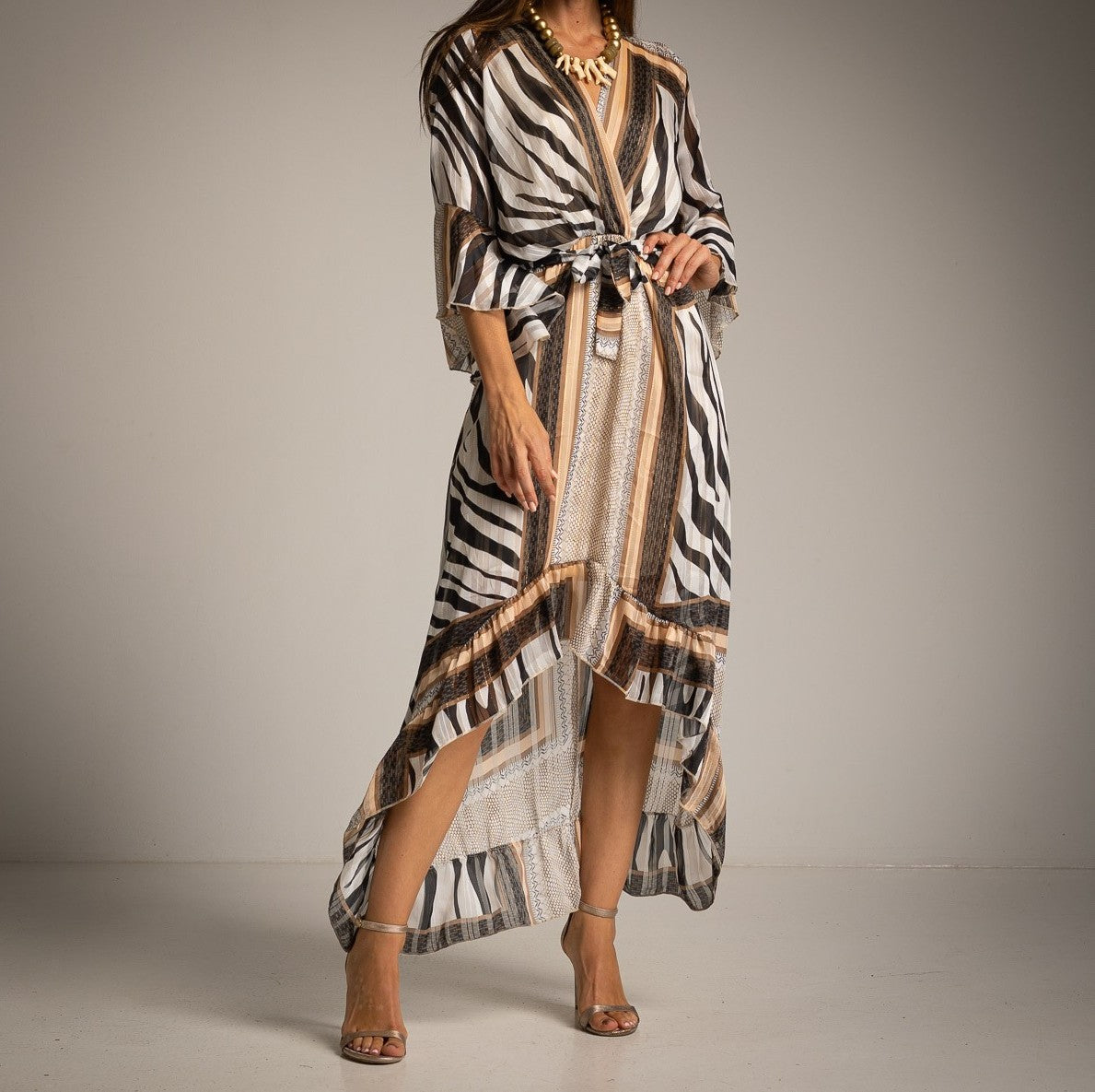 Beige animal print maxi dress with V-neckline, tie belt and high-low hem – front view