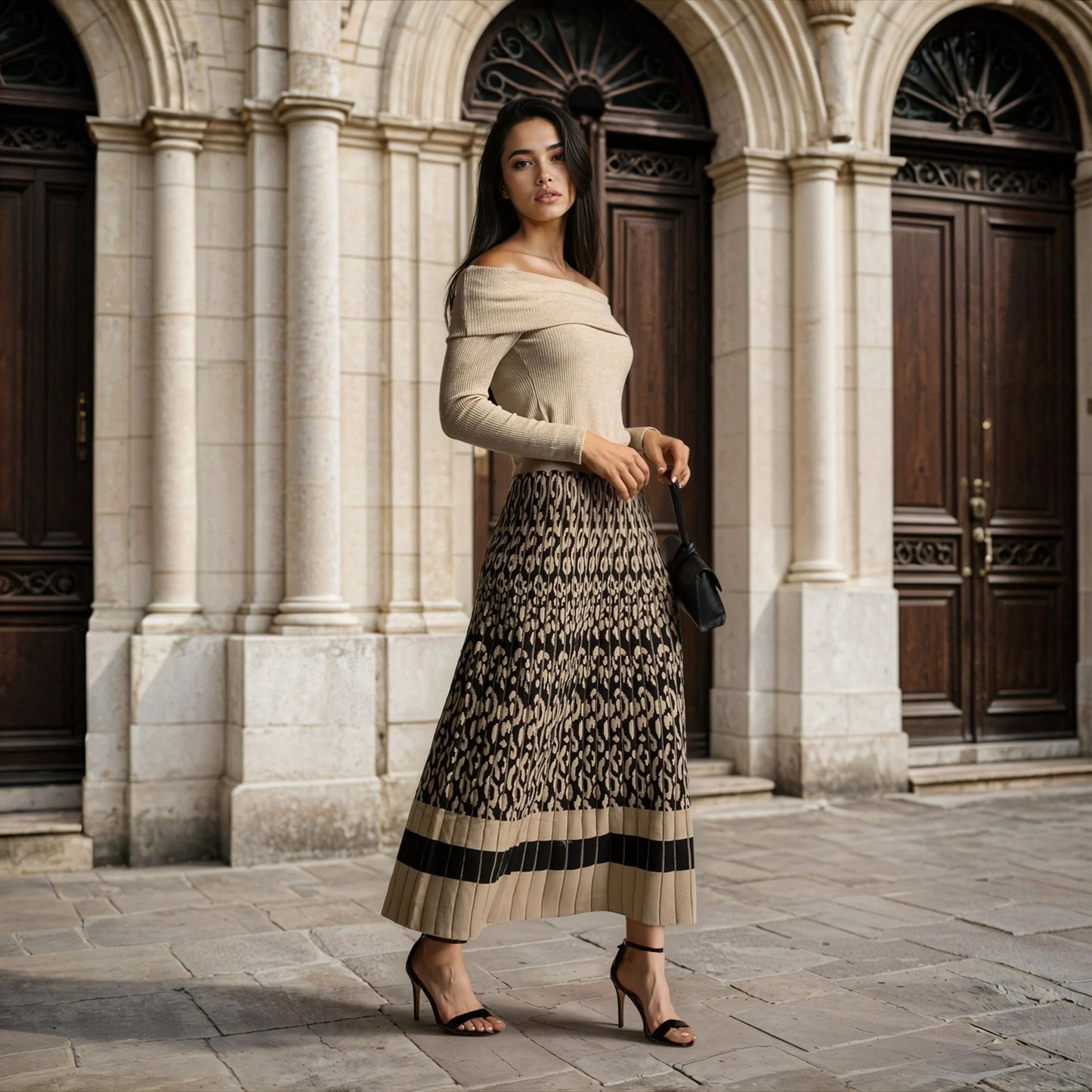 Animal print pleated knit skirt styled with off-shoulder knit top – outdoor full look