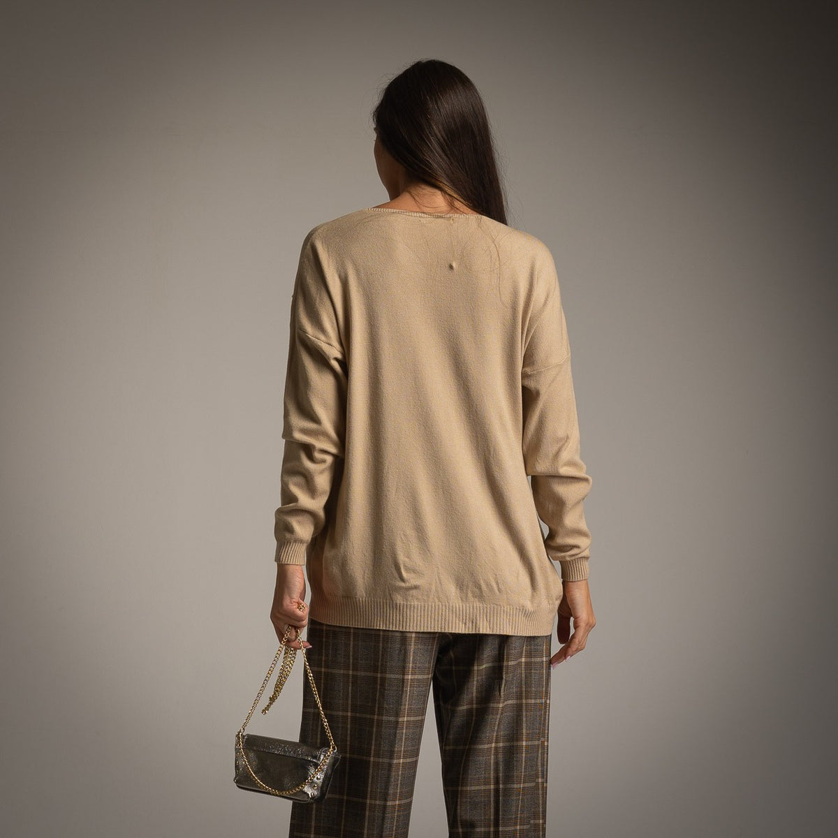 Latte Beige oversized V-neck knit sweater with golden glitter foil and embellished LOVE detail - back view